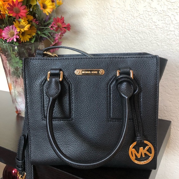 Michael Kors Accessories - 7-1/2” tall x 9” wide